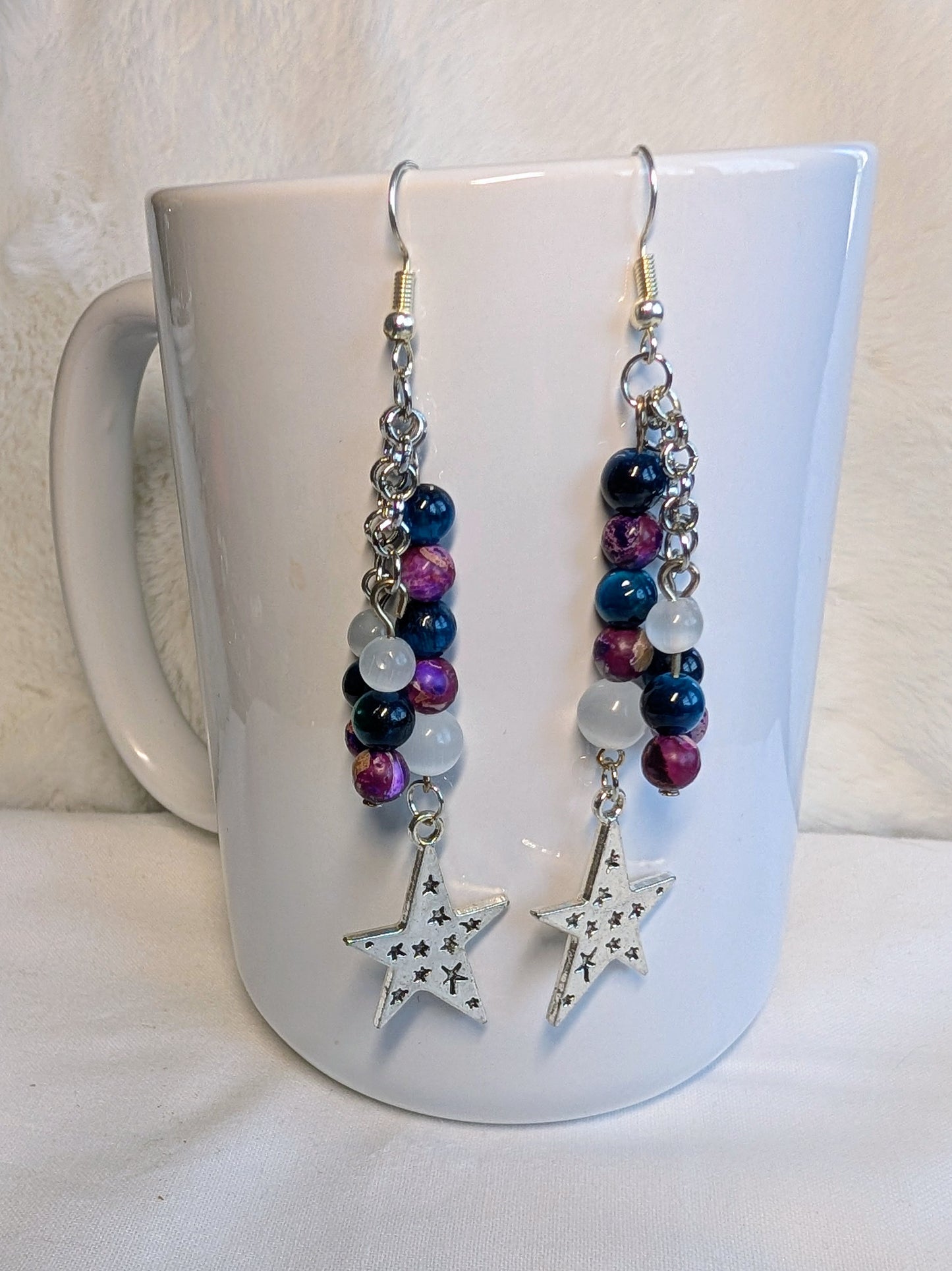 Dangly crystal star earrings